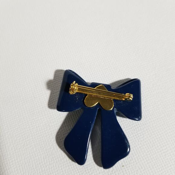 Vintage blue bow brooch (looks green under black light) - Picture 9 of 11